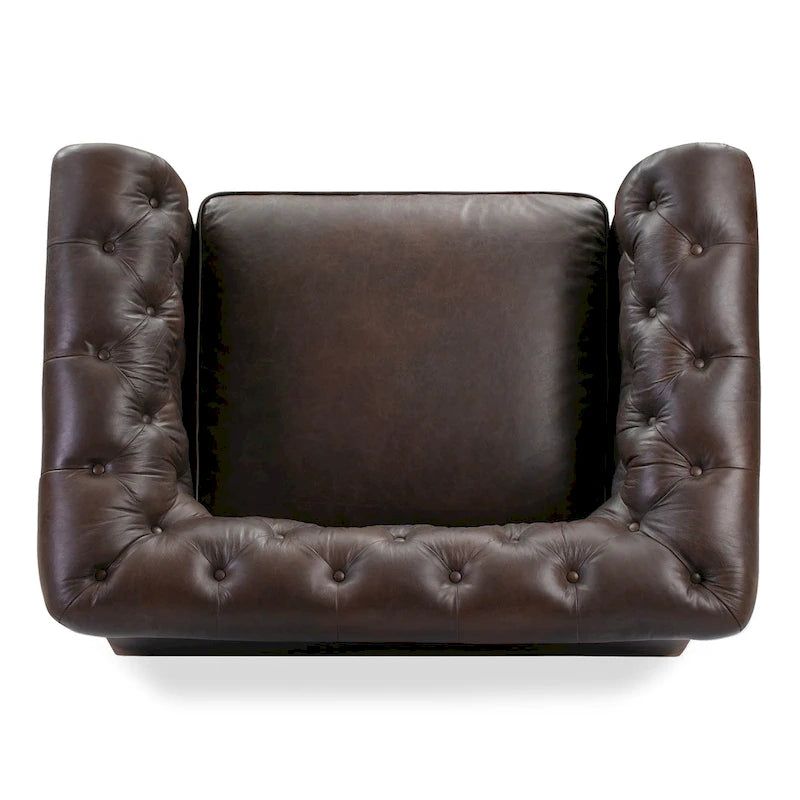 Gepolsterter Loungesessel aus italienischem Leder mit Knopfheftung und gerollten Armlehnen